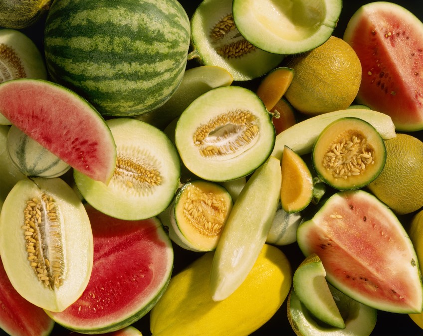 Various melons, whole & halved